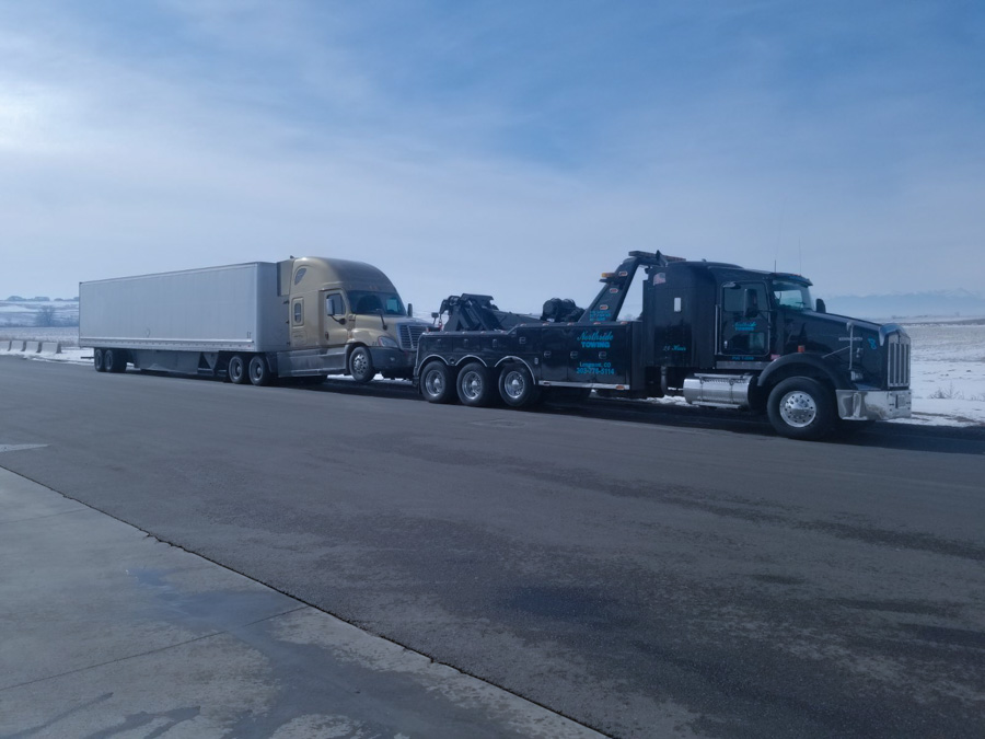 black tow truck heavy duty towing semi trailer